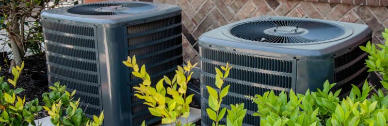 HVAC technician performing AC repair service in Lemon Grove CA home